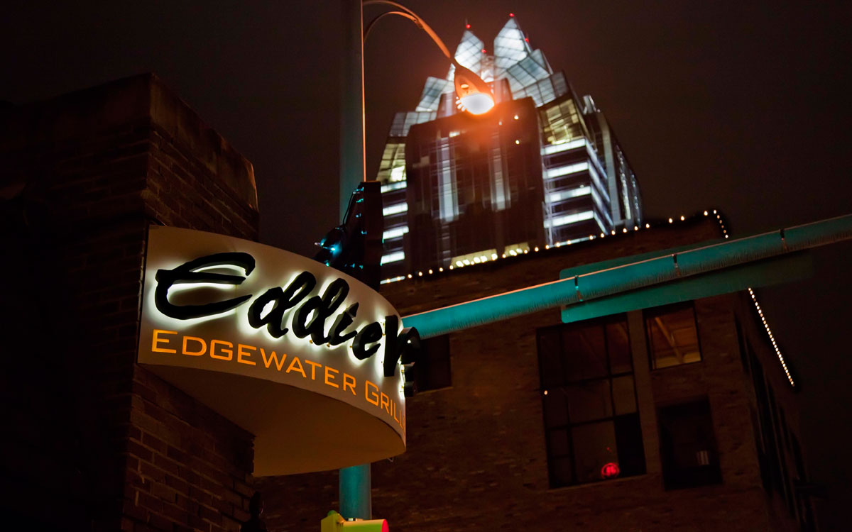 Eddie V's Sign Against A Night Sky In Austin, Texas