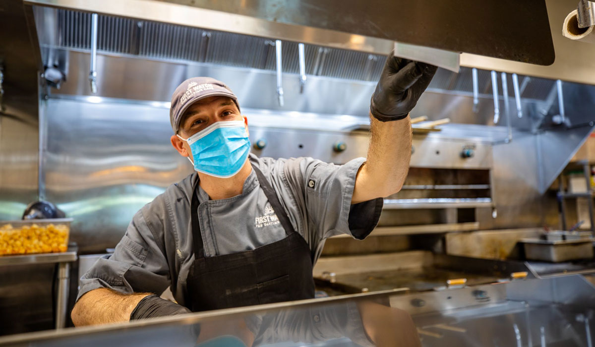 First Watch Employee Wearing A Mask