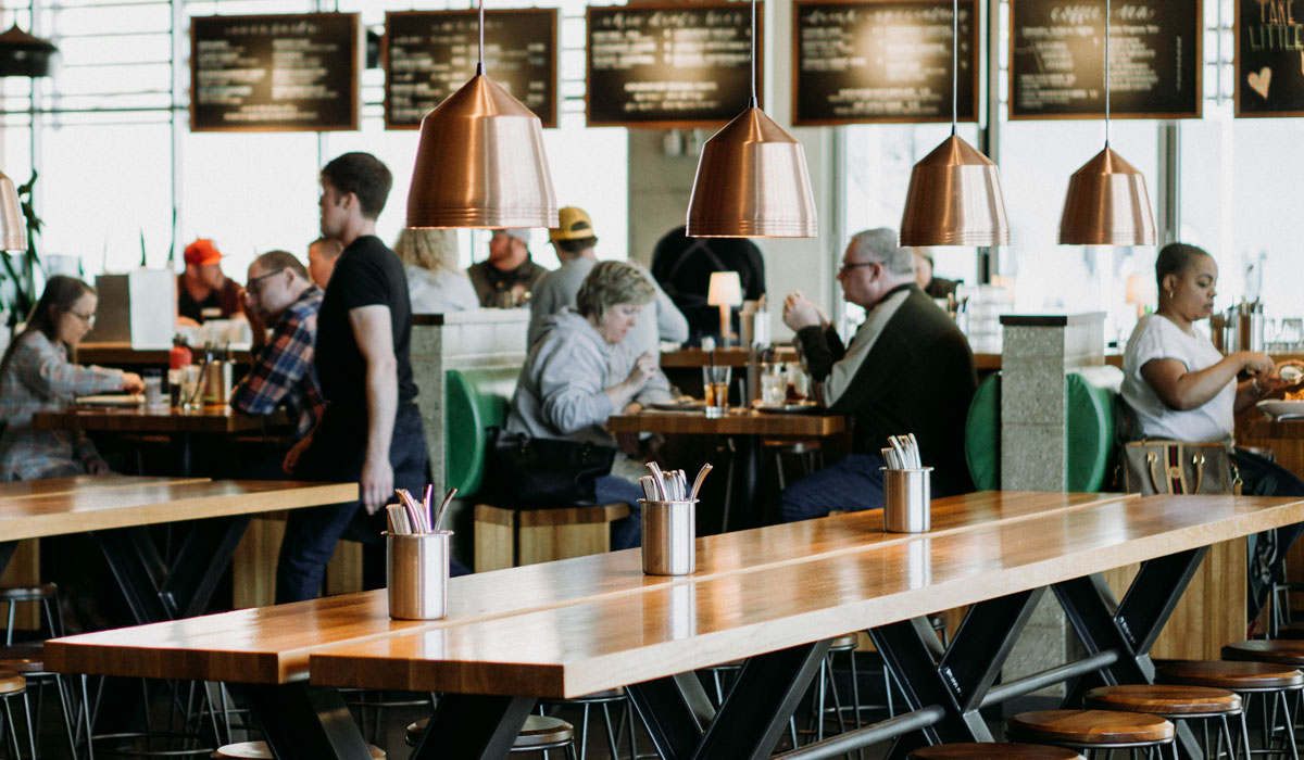 Restaurant Guests Dine At A Table