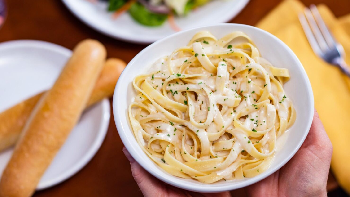 Olive Garden pasta and breadsticks.