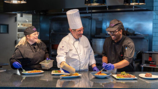 Cooks and chef in the kitchen.