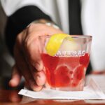 Drink from The Sazerac Bar.