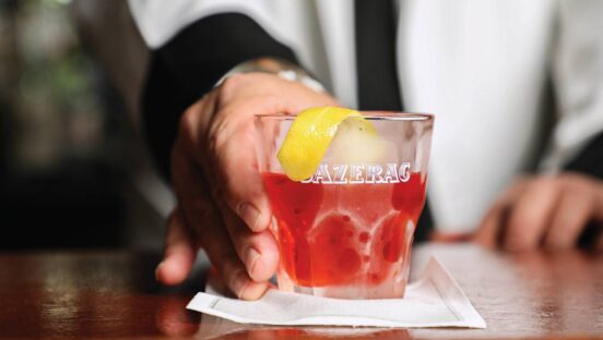 Drink from The Sazerac Bar.